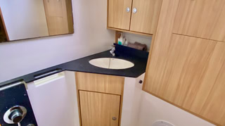 Bathroom ensuite, rear cabin on  on  Sailing Yacht Curlew Escape, available for private yacht charters on Moreton Bay, Brisbane.