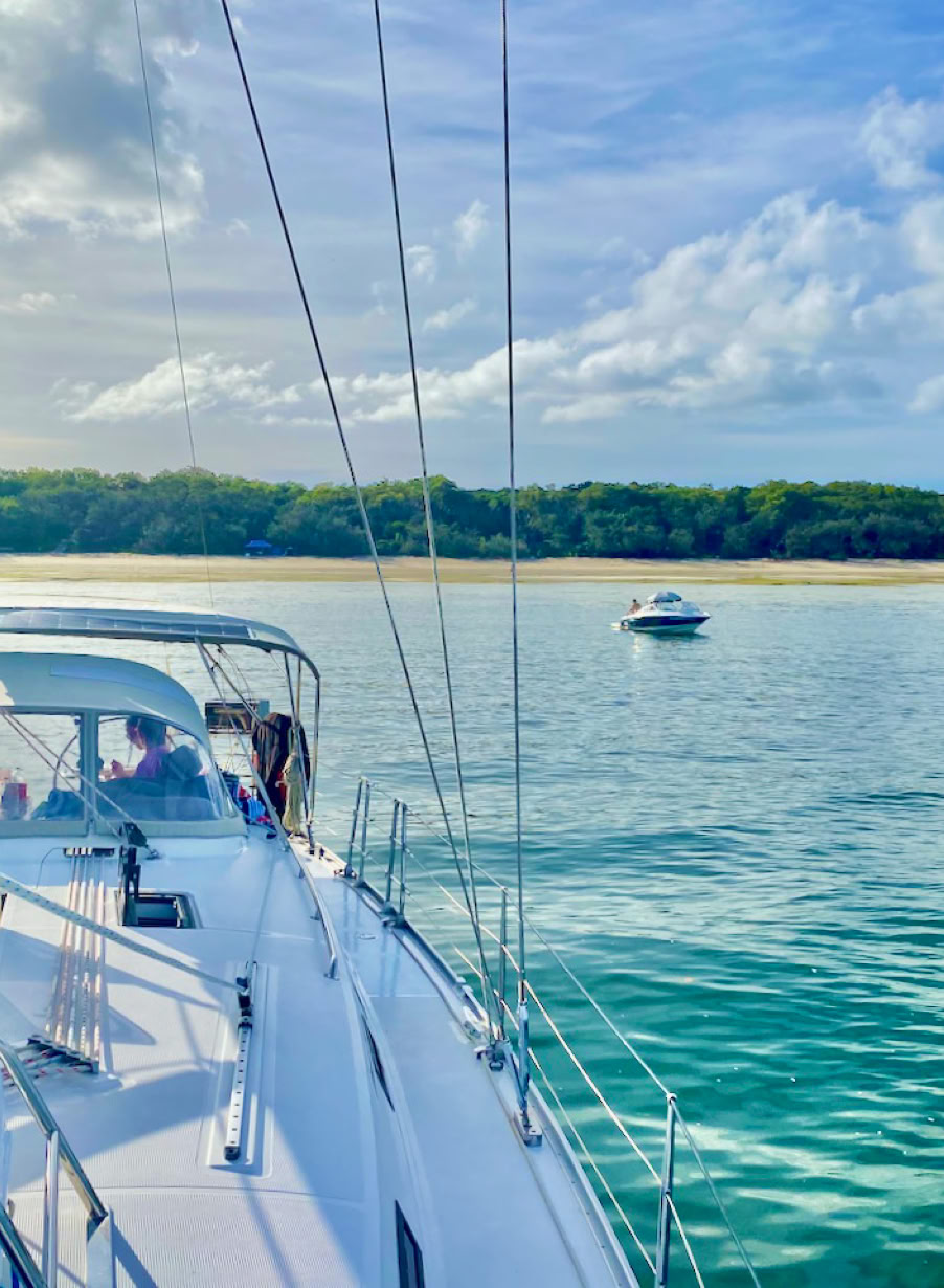 SUP at Horseshoe Bay, Peel Island, Moreton Bay, Brisbane while on a private yacht charter aboard Curew Escape