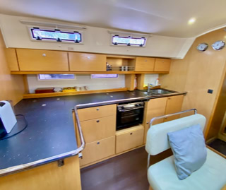 Fully equipped kitched with two fridges on Sailing Yacht Curlew Escape, available for private yacht charters on Moreton Bay, Brisbane.